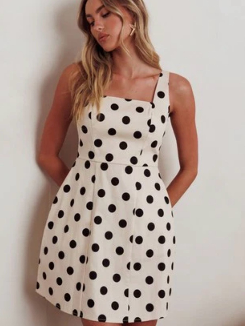 Sleeveless cream Mini Dress with Black Polka Dots